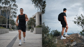 Two men rucking, one wearing a weighted backpack, the other a weighted vest