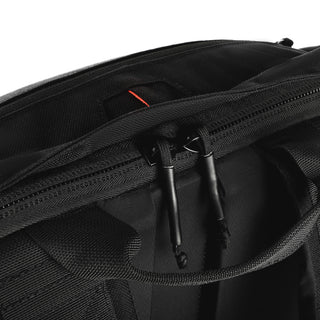 Rucking backpack exterior in black color with black zip